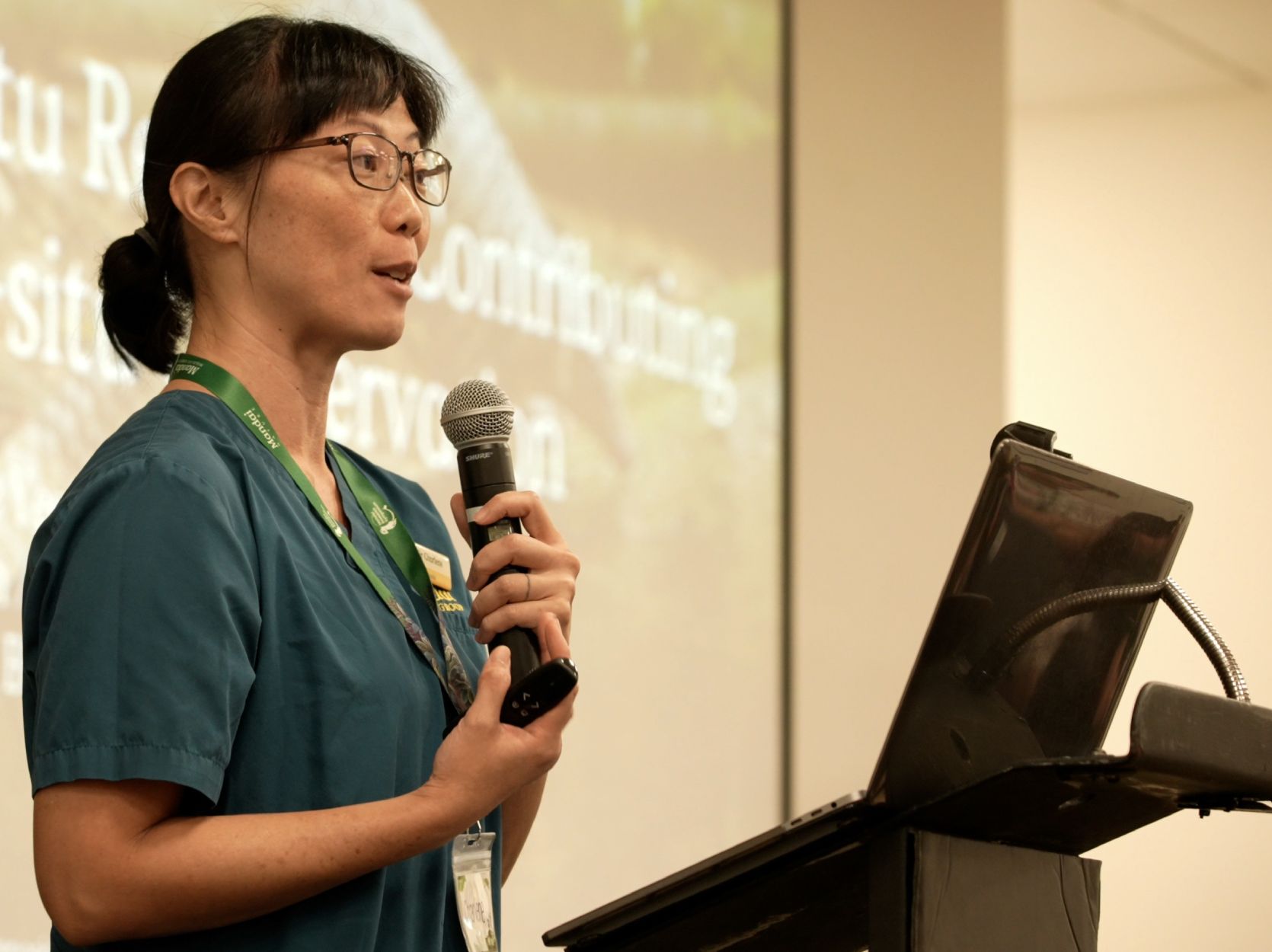 Wildlife expert speaking with a microphone