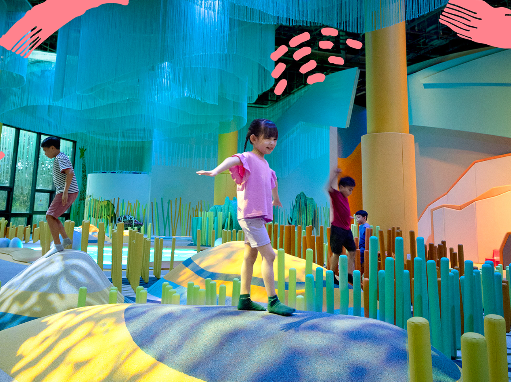 children playing and balancing in an indoor playground