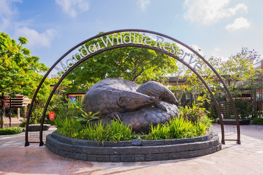 This sculpture of a Sunda pangolin and its pangopup greets you at Mandai Wildlife EAST